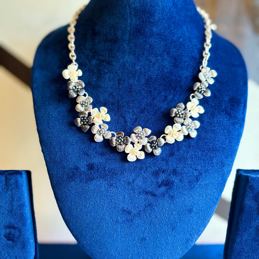 Flowers in Multi Colors Brought Together in a Brass Necklace to make a Statement - RYZZ