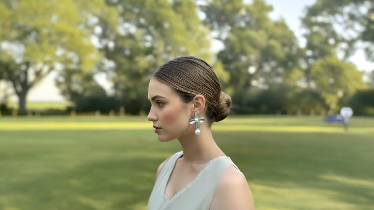 Woman wearing Silver Plated earrings in a park setting